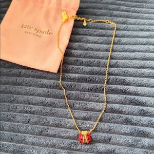 Kate Spade Gold Necklace with Red Ladybug Pendant